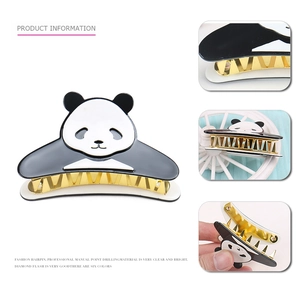 Pince à cheveux panda mignonne en noir et blanc avec dents en métal doré pour femme