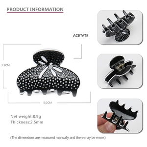 Polka dot acetate hair claw clip with cutout design for elegant French style styling