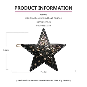 Détail de la pince à cheveux étoile en acétate avec strass colorés et dimensions de 7,4 cm