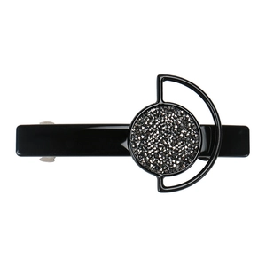Close-up of geometric circular hair clip with sparkling grey rhinestones in black finish