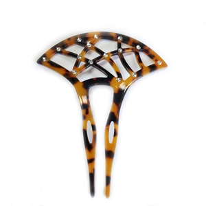 Detail of tortoise shell fan-shaped hair fork with sixteen sparkling rhinestones