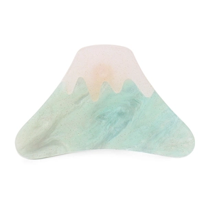 Detailed macro view of Mount Fuji hair claw clip with pink and mint marble texture