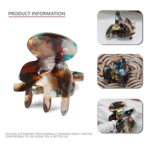 Mini acetate hair claw clip with brown and blue marble texture for women