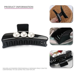 Elegant black acetate shark hair clip with three large white pearls for thick hair