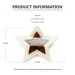Detailed view of layered acetate star hair claw with tortoiseshell pattern and 8.4cm dimensions