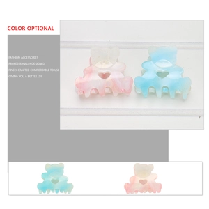 Glittery bear hair claws set with heart cutout design in pink and blue resin