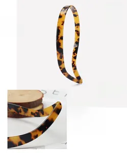 Detail view of acetate tortoise hairband showing dimensions 14x12.2cm and weight 12.7g