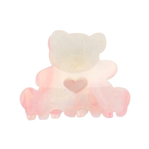 Pink and cream gradient bear hair claw with gold glitter and heart cut-out detail