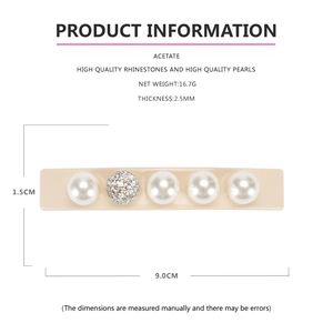 Detail view of acetate spring hair clip with pearls and rhinestones measuring 9.0cm