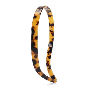 Detail shot of the glossy tortoiseshell leopard print acetate slim headband