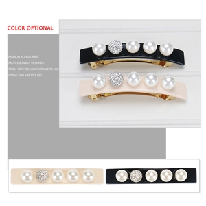 Classic French acetate spring hair clip with pearls and crystal accents in black and beige