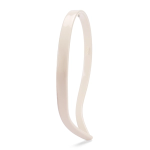 Detailed view of cream-colored slim headband featuring anti-slip inner teeth and glossy finish