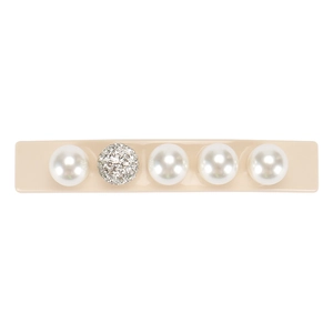 Detail view of long bar hair clip featuring white pearls and a sparkling rhinestone ball