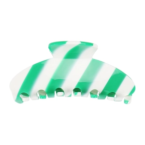 Macro detail of large green and white striped acetate hair claw clip with glossy finish