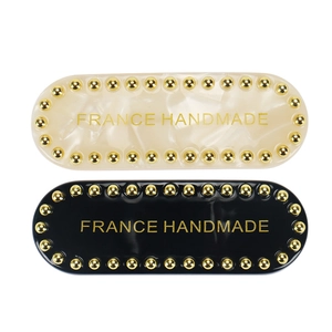 Elegant acetate hair clips in black and beige with gold studs and France Handmade lettering