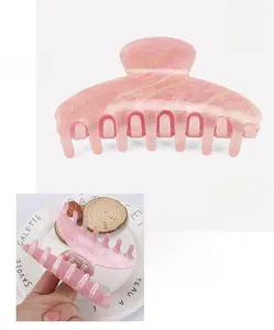 Pink glitter acrylic hair claw clip detail with size 10.3x4.5cm and 23.3g weight specs
