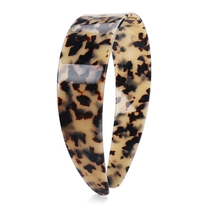 Detailed 45-degree angle view of wide 4cm tortoiseshell acetate headband with anti-slip teeth