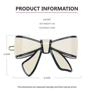 Detail view of acetate bow hair clip showing 6.5x3.2cm size and 7.0g weight specs