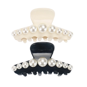 Classic acetate hair claw set with pearl inlay in black and creamy white finishes