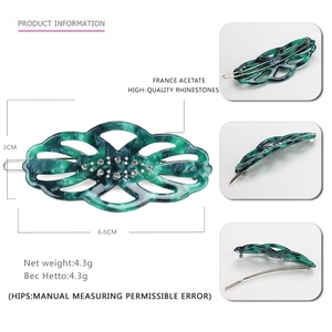 Detail view of acetate leaf hair clip with rhinestones and dimensions showing size 6.6x3cm