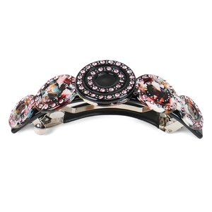 Retro curved acetate hair clip with rhinestones and vintage marbled disc design