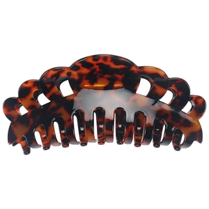 Detail of 14cm tortoiseshell acetate claw clip with smooth finish and multi-tooth design