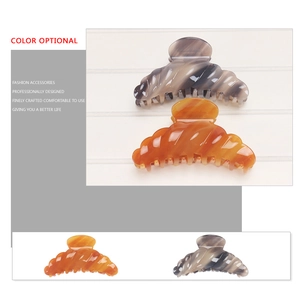 Elegant marble acetate hair claw clip with anti-slip teeth and wavy design