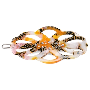 Close-up of tortoise shell pattern acetate hair clip with sparkling rhinestone details