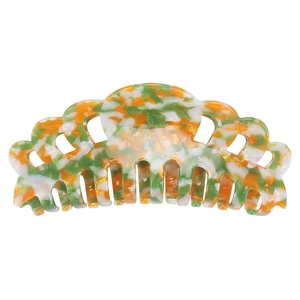 Macro detail of the 14cm acetate hair claw clip featuring tri-color floral patterns
