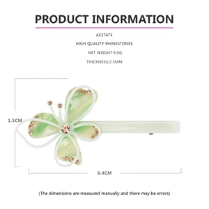 Diagramme détaillé du clip papillon en acétate de 9,4 cm avec dimensions et strass brillants