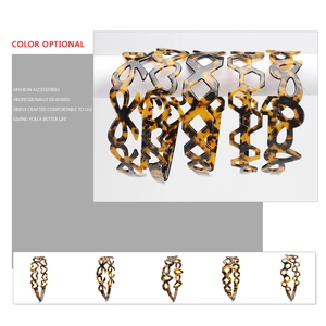 Retro tortoiseshell acetate headbands featuring hollow bow and heart designs for women