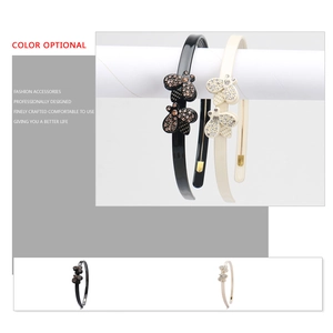 French chic acetate headband with diamond-studded butterflies in black and cream