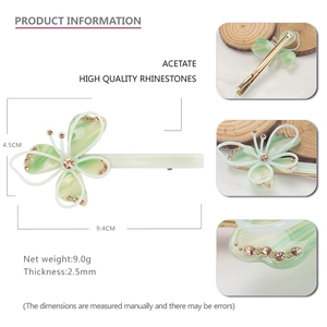 Pince à cheveux papillon élégante en acétate avec motif marbré vert et strass