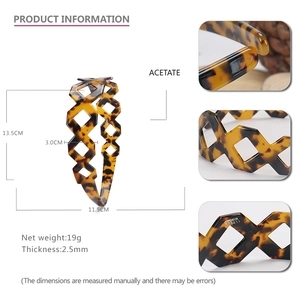Tortoiseshell acetate headband with hollow diamond design and leopard print finish