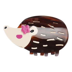 Détail de la pince à cheveux hérisson en acétate avec fleur rose et motif écaille