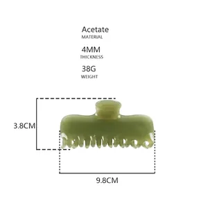 Detalle de la pinza para el pelo de acetato verde frijol de 4mm con medidas de 9,8cm largo
