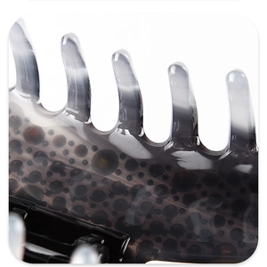 Macro detail of smoke grey acetate hair claw clip showing unique bubble texture and teeth