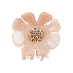 Haarklammer in Blumenform aus Acetat mit Goldglitzer und Strassmitte auf weißem Hintergrund