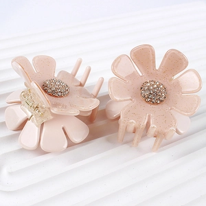 Zweiteiliges Set Haarklammern mit rosa Essigsäureblüten, Goldglitzer und Strasssteinen