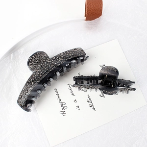 Classic grey acetate hair claws with rhinestones in two sizes for elegant styling