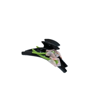 Elegant black acetate hair claw clip featuring exquisite white calla lily flower design