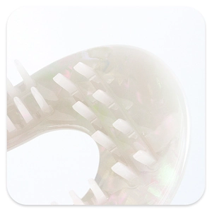 Macro detail of curved holographic acetate hair claw clip with iridescent finish and teeth