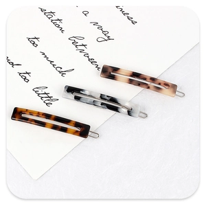 Set of three acetate rectangular hair clips with tortoiseshell and marble patterns