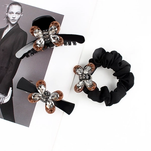Ensemble d'accessoires de coiffure noirs avec pinces à cristaux et chouchou élégant