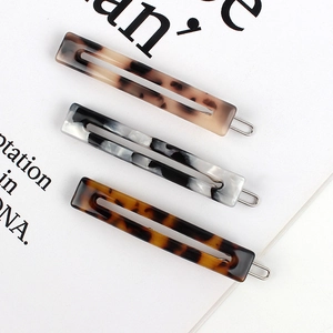 Classic rectangle acetate hair claw clips with tortoise and marble patterns