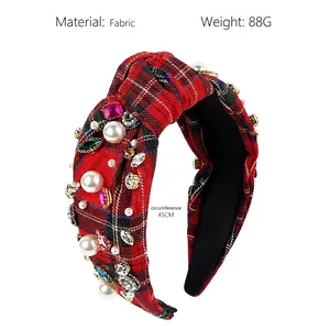 Detail of red plaid headband with sparkling rhinestones, pearls, and gemstone embellishments