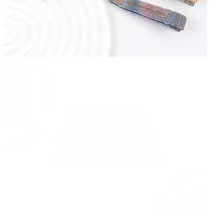 Detailed close-up of acetate toothpaste shaped hair clip with purple gradient finish