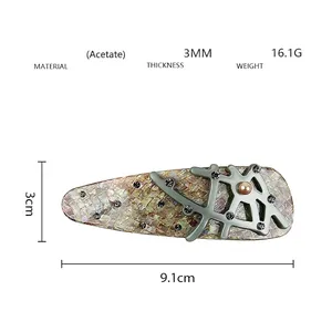 Detailed dimensions of a vintage branch style acetate hair clip with diamond accents