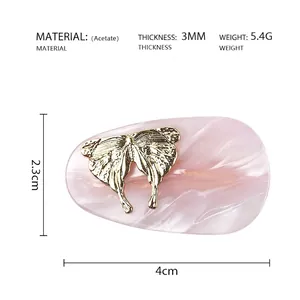 Detailed size specifications of pink acetate butterfly hair clip with golden metal accent