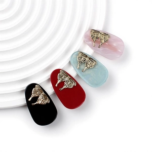 Elegant acetate hair clip set with golden metal butterfly ornaments in four colors